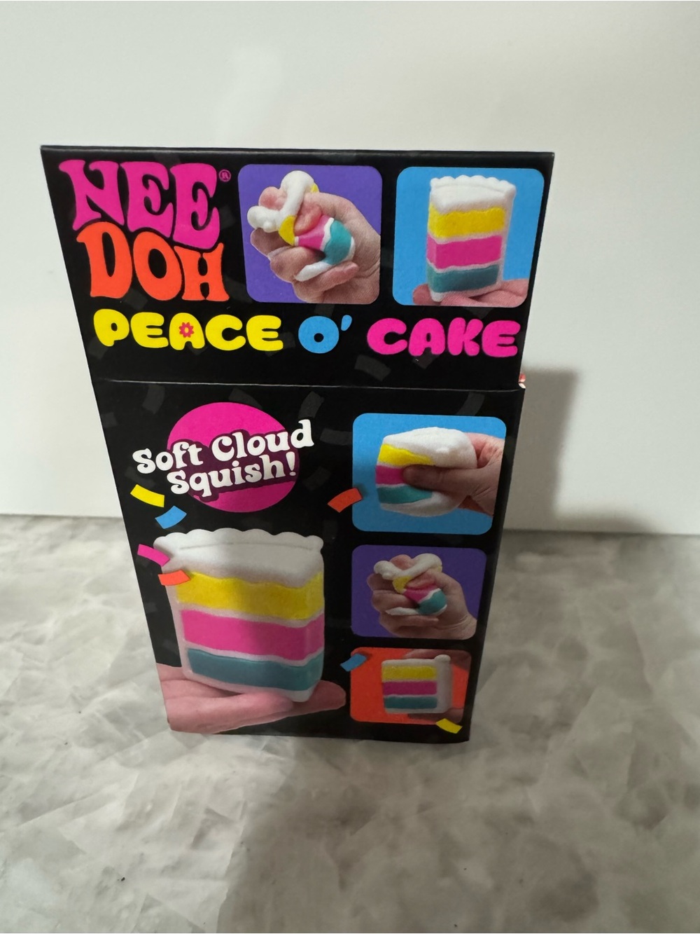 Nee Doh Peace O' Cake Squeeze Toy - White, Yellow, Pink, Blue - Picture 3 of 6